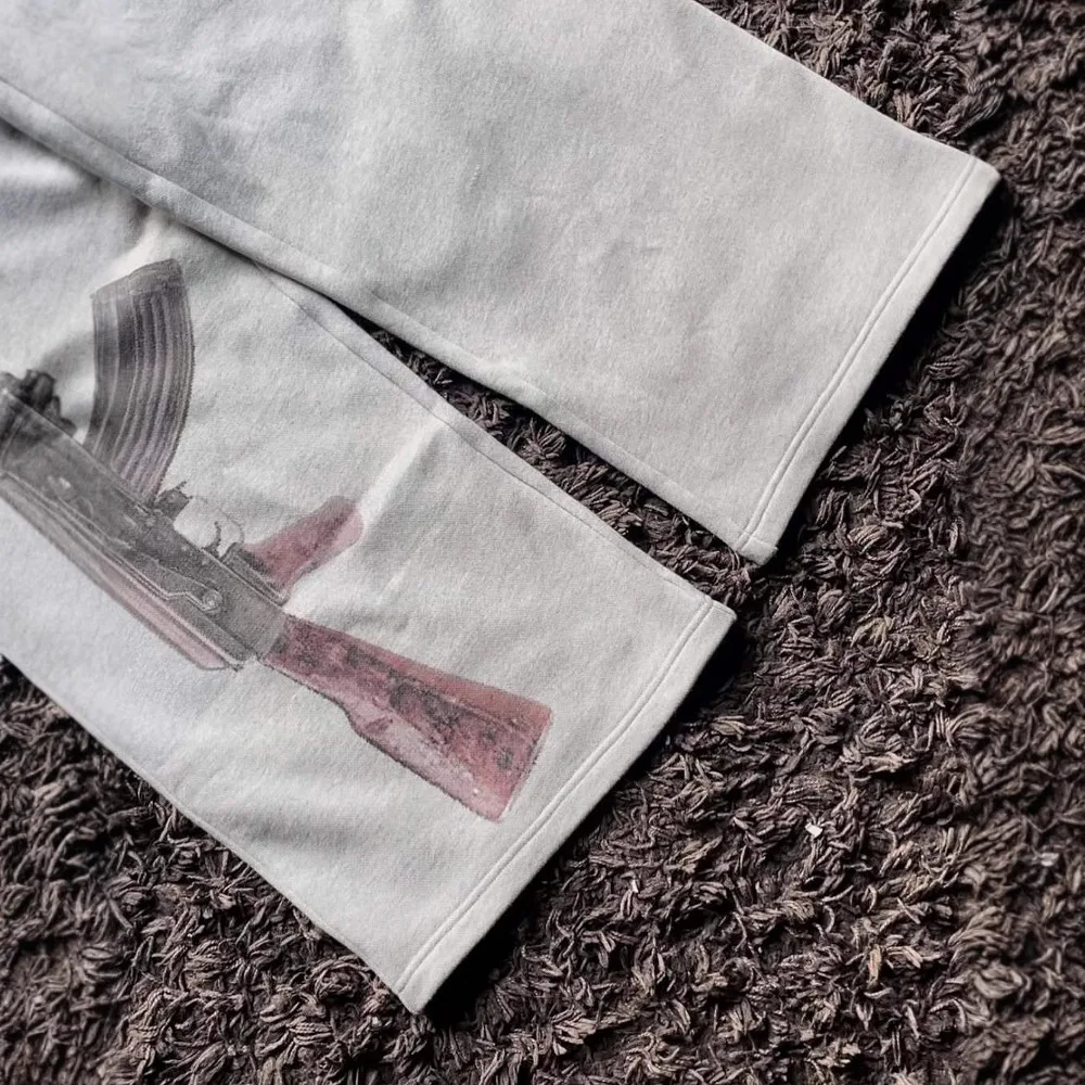 بنطال رياضي أوروبي وأمريكي بخصر مزدوج مطرز للشارع قابل للطي لخريف 2025 جديد