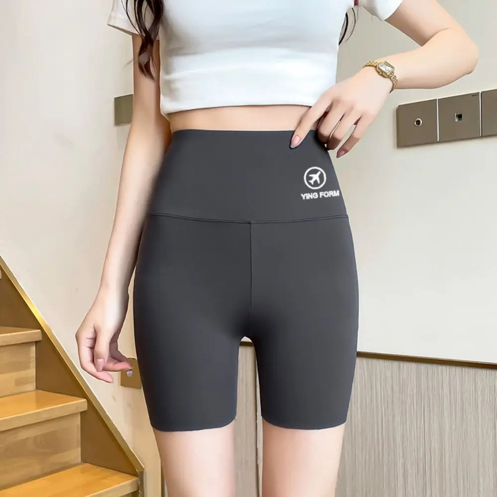 Pantaloncini da Yoga attillati senza cuciture con sollevamento dell'anca Leggings da donna traspiranti con controllo della pancia alla pesca