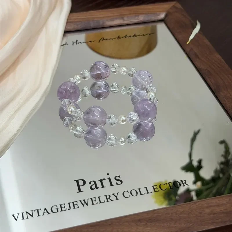 Natural amethyst starlight black powder crystal bracelet, simple design sense, size, Zhutianhe stone white crystal bracelet.