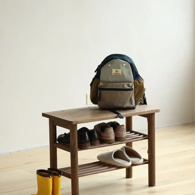 

Black walnut door shoe change stool coat rack integrated against the wall solid wood porch shoe hanger simple rack