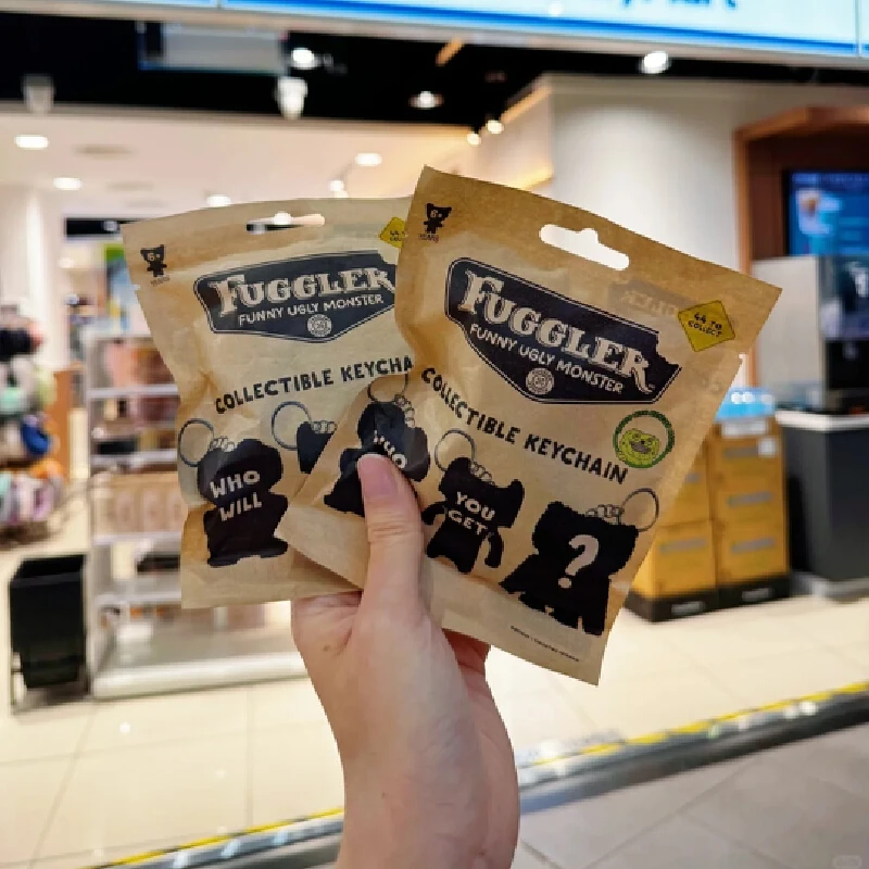 Fuggler genuíno bonito dente monstro série caixa cega brinquedos portáteis chaveiro pingente feio bonito na moda mini boneca saco ornamento presentes