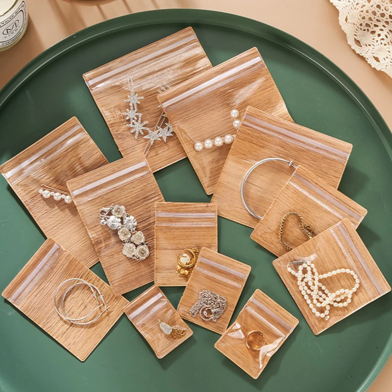 50PCS Half-Transparent PVC Jewelry Bag Wood Grain Ziplock Pouches fit Handmade DIY Necklace Earring Bracelet Packaging Wholesale