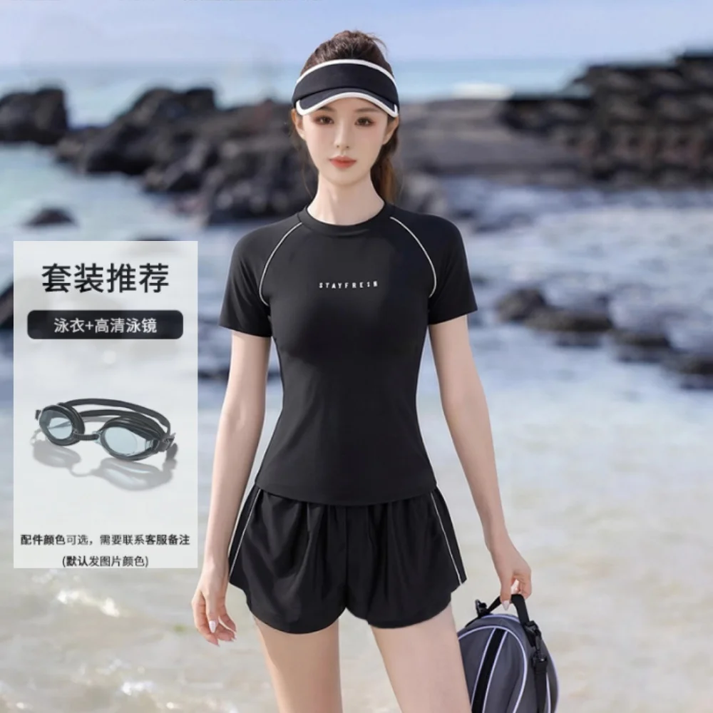 Black [swimsuit + swimming goggles]