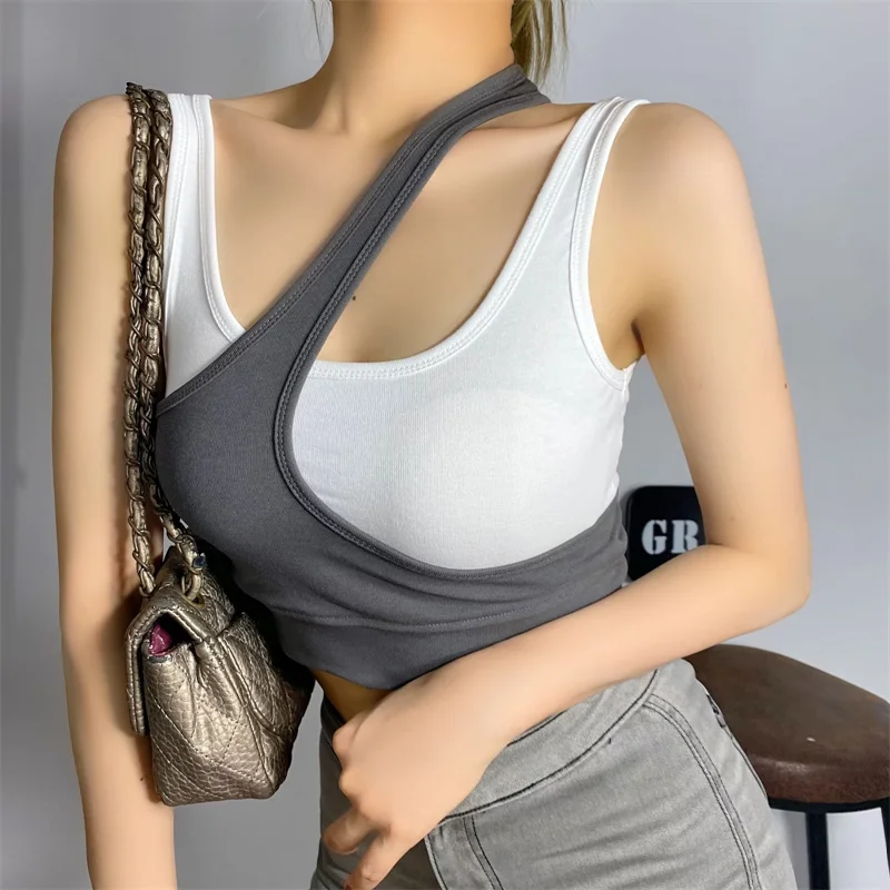 Gilet asimmetrico americano di colore retrò Gilet sportivo piccante da donna con cinturino multiplo per yoga elastico con ombelico