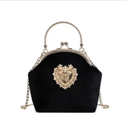 Bolso de mano de noche con forma de corazón para mujer, bolso de mano de Metal brillante, bolso cruzado de hombro con cadena de moda, monedero de lujo