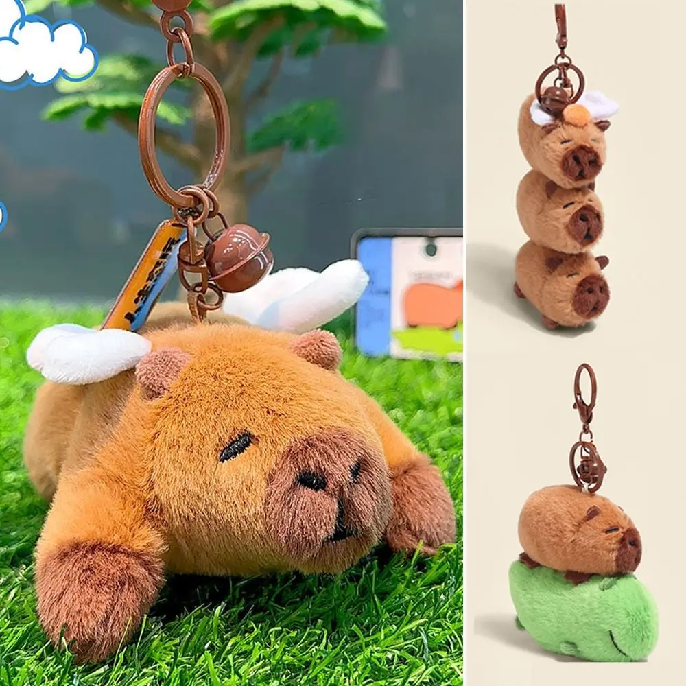 ใหม่ Creative Capybara จี้ตุ๊กตาการ์ตูน Capybara ตุ๊กตาตุ๊กตารถพวงกุญแจแขวนกระเป๋าเป้สะพายหลัง Decor หญิง