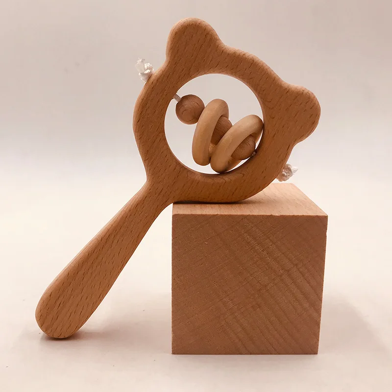 Hochet musical Montessori dos TeWindsor en bois de hêtre naturel pour bébé, jouet d'entraînement à la main, jeu à mâcher, salle de sport, cadeau pour nouveau-né