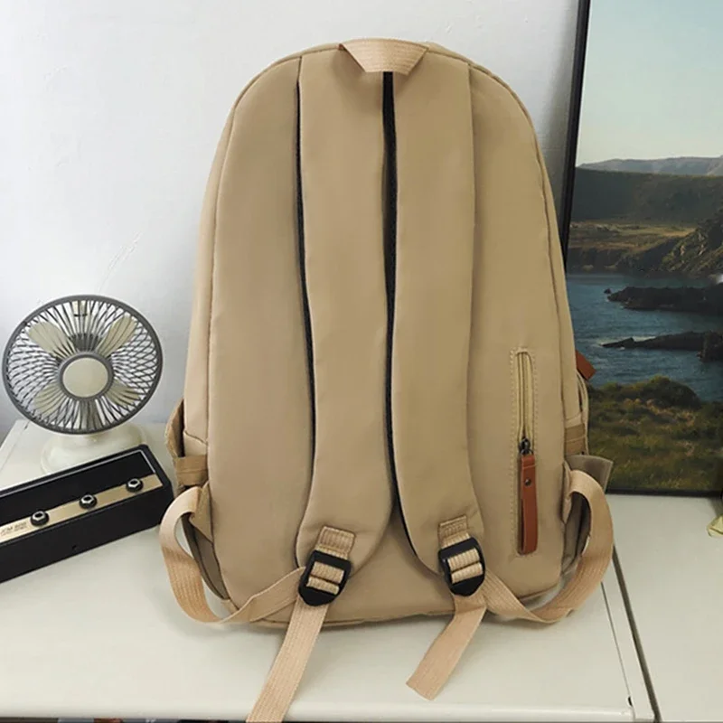 High end solid color high-capacity computer bag for male and female college students, outdoor leisure travel backpack