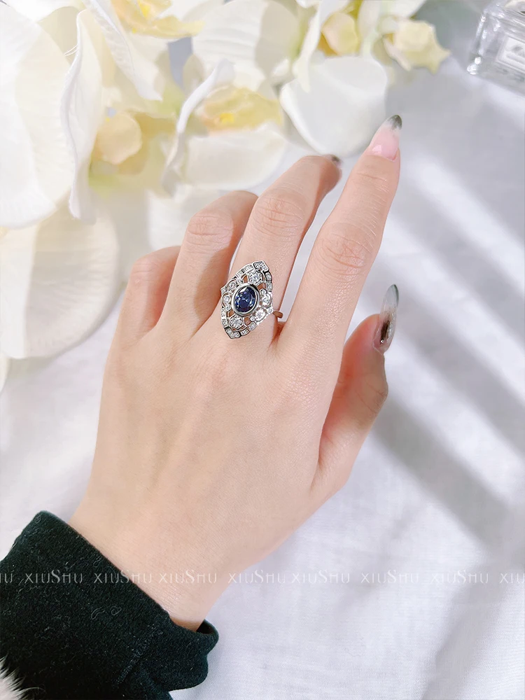 New hollow oval Tanzanian blue 925 sterling silver ring set with high carbon diamond micro inlay, niche wedding jewelry