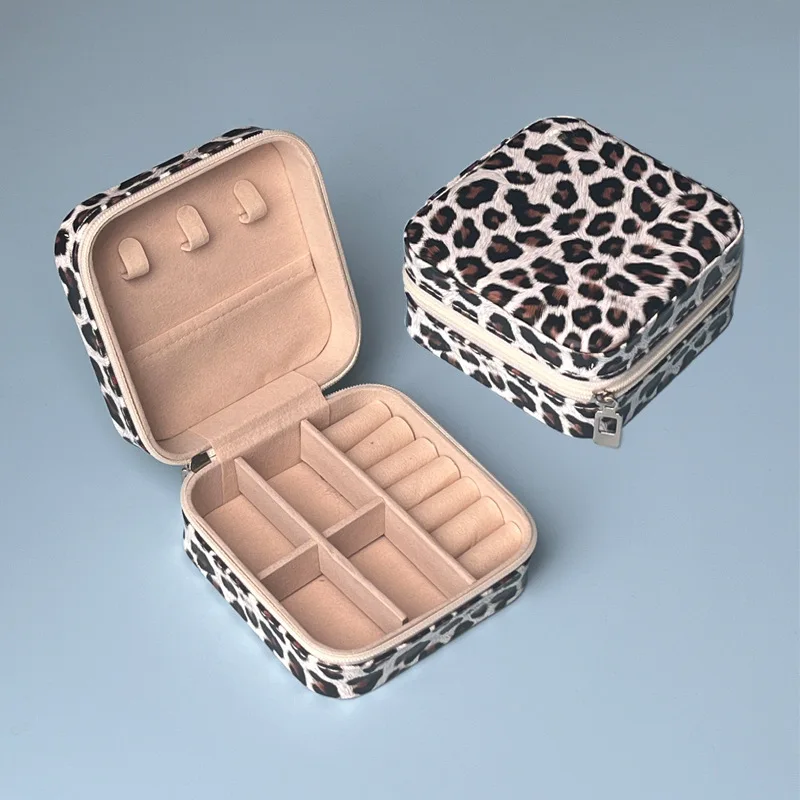A brand-new, portable leopard-print jewelry box, perfect for storing small accessories.