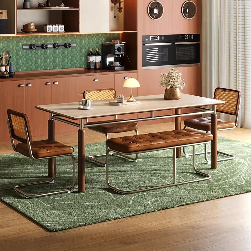 

Bauhaus rock slab solid wood dining table and chairs 2026 new travertine American retro home small apartment French antique