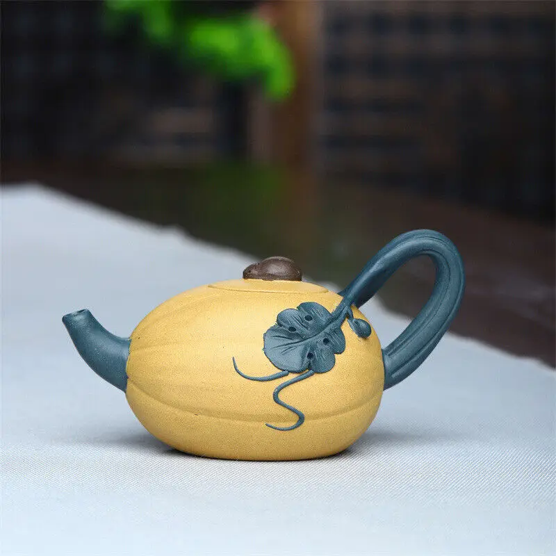

Handmade Raw Ore Mud Two-color Cantaloupe Pot Card Cover Flower Ware Teapot Tea