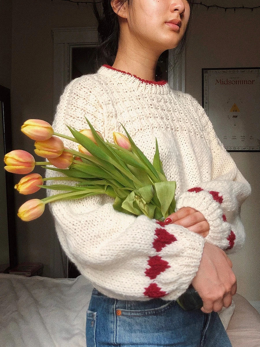 Wrap Yourself in Love with our Ivory White Heart Long Sleeve Sweater - Perfect for Fall and Valentine's Day!