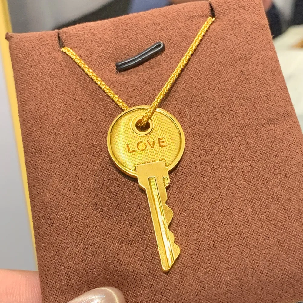 The key of happiness necklace senior sense simple hollow clavicle chain female 9999gold
