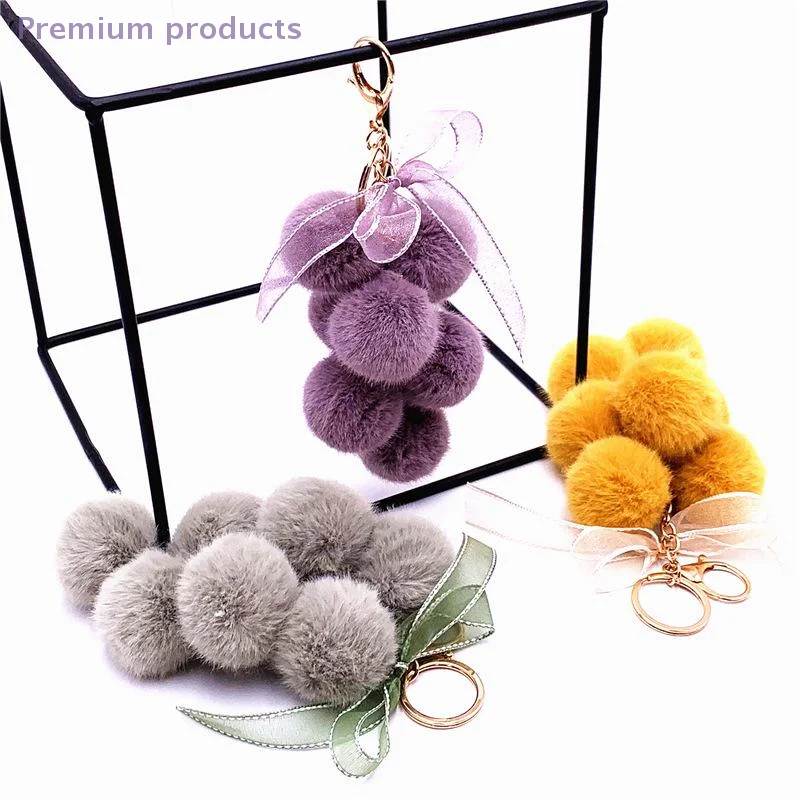 Carino creativo uva frutta fiocco in pizzo palla di pelo bambola di peluche giocattolo portachiavi ciondolo borsa zaino appeso fascino portachiavi per auto regalo di Capodanno