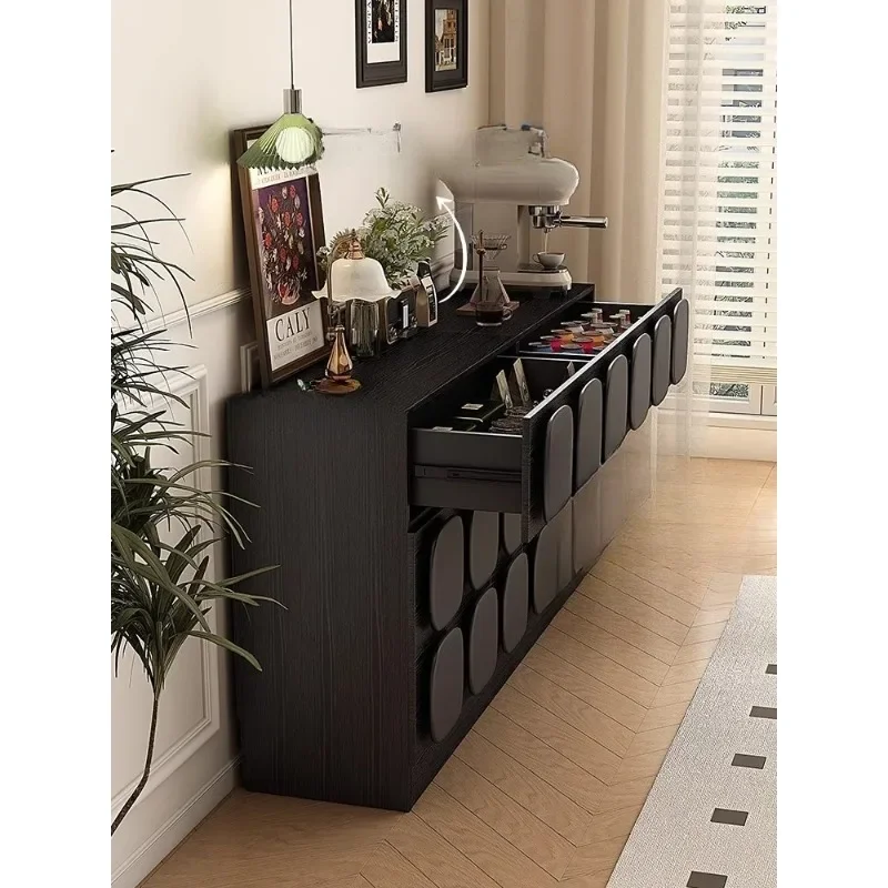 

Black retro coffee machine cabinet against the wall tea beverage