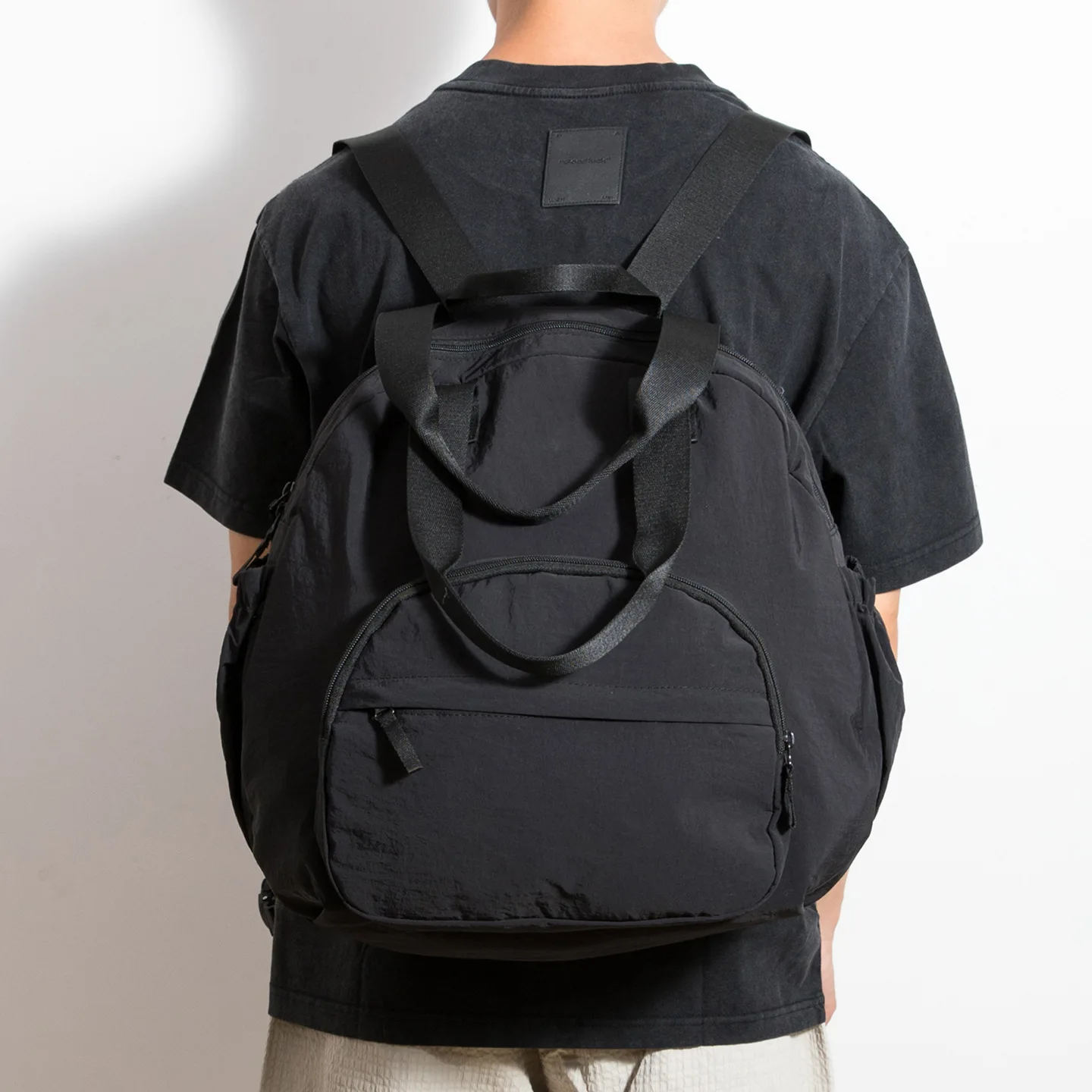 Mochila de nailon con bolsillo para hombre, ropa de calle, mochila escolar para ordenador portátil de gran capacidad, mochila informal negra para ir al trabajo, mochila de viaje para hombre