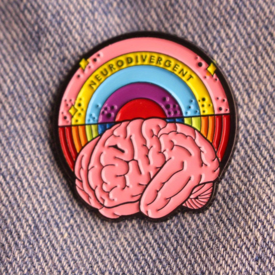 A quirky metal enamel brain pin, great for backpack and clothing decoration, a stylish gift for friends.