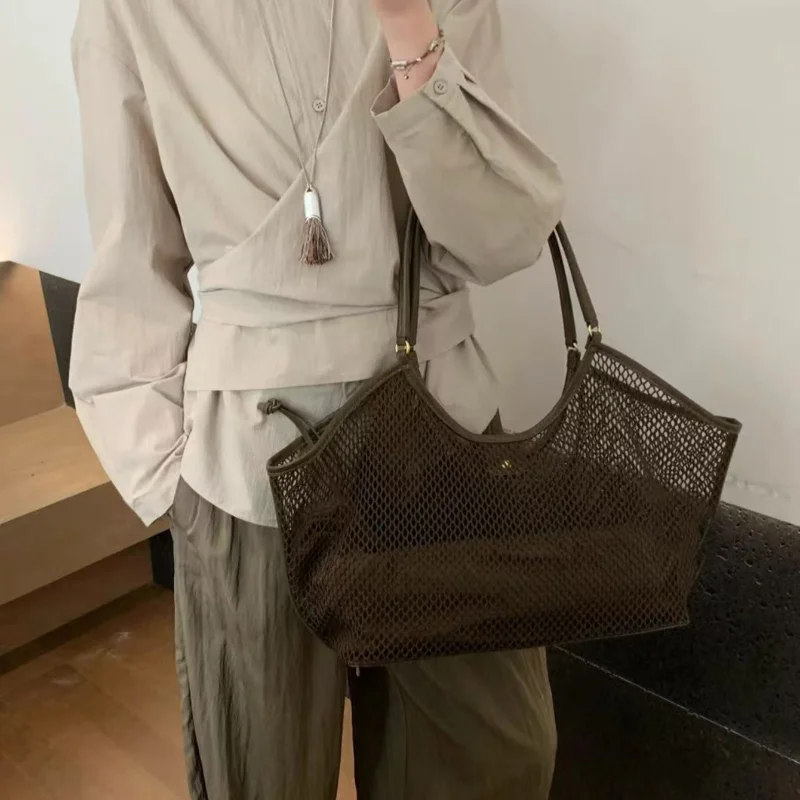 

PU LeatherWomen's Large Capacity Woven Bag Beach Travel Shoulder Bag Handheld Net Bag Fashionable Simple Travel Bag