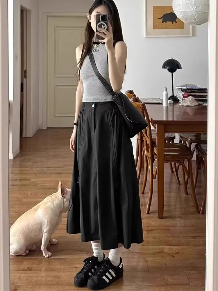 Femme nouveau dans les vêtements a-ligne taille haute décontractée minceur gâteau jupe polyvalent mi-longue robe douce noir jupe longue tout-match