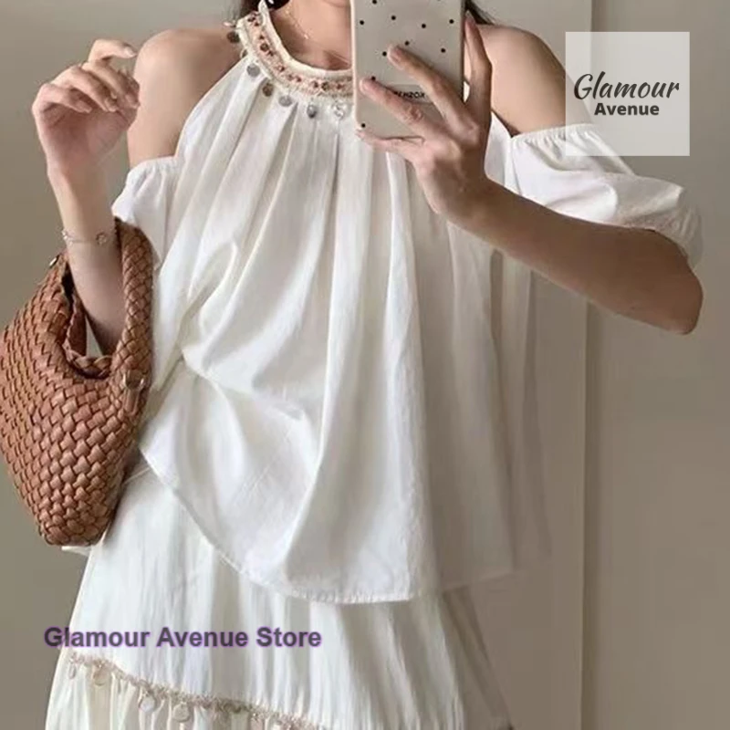 

Korean Blue Off-the-Shoulder Hanging Neck Shirt Women's Summer New High-grade Heavy Industry Bead Off-the-Shoulder Loose Top