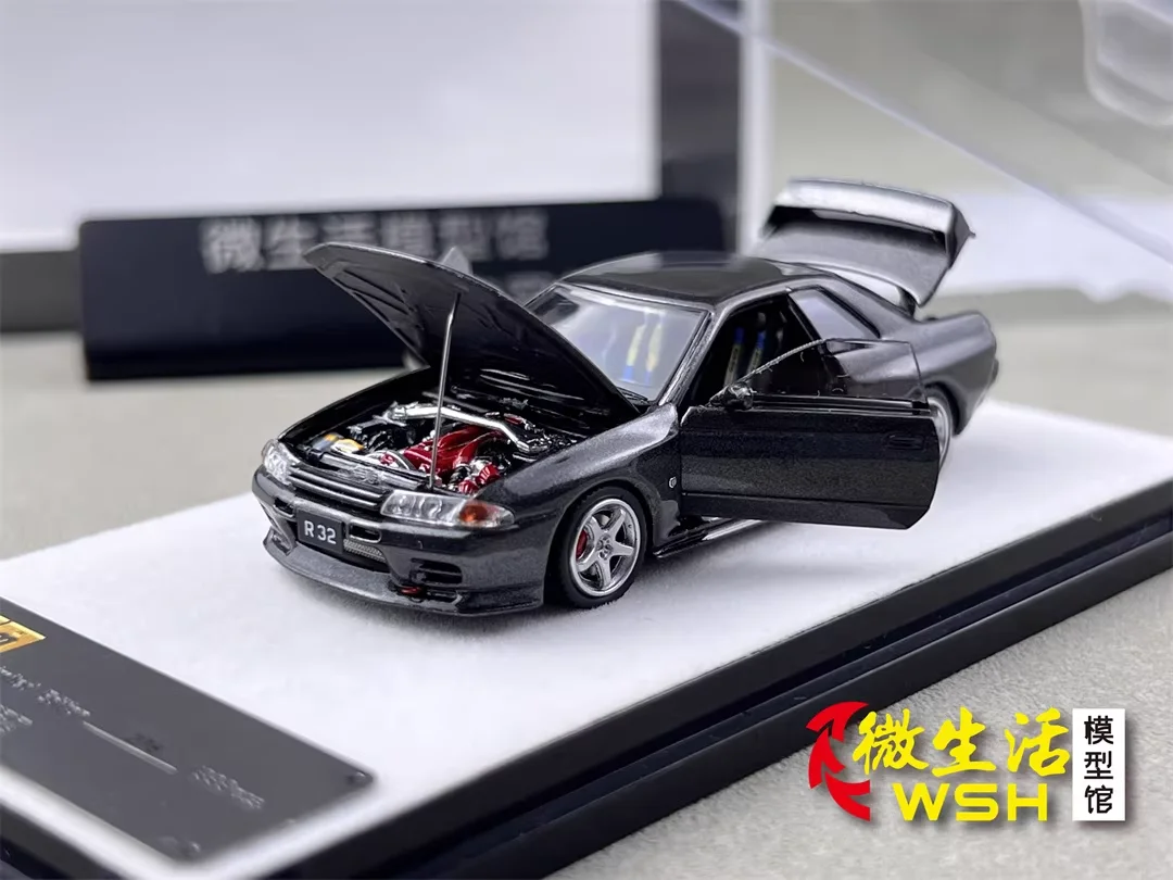 

Модель автомобиля PGM 1:64 R32 серого цвета, полностью открывающаяся, литая под давлением, в наличии, 2025 год