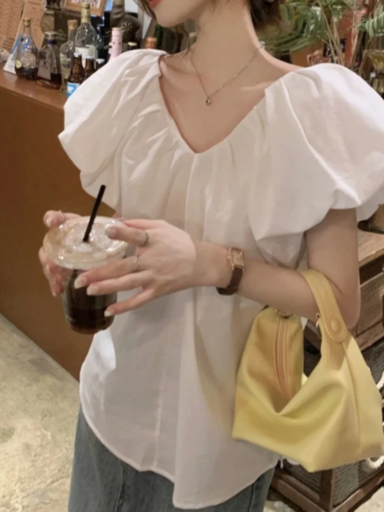 Csa blanca suave con mangas de burbujas para mujer, Top pado con cuello en V y espalda descubierta, estilo informal, ho...