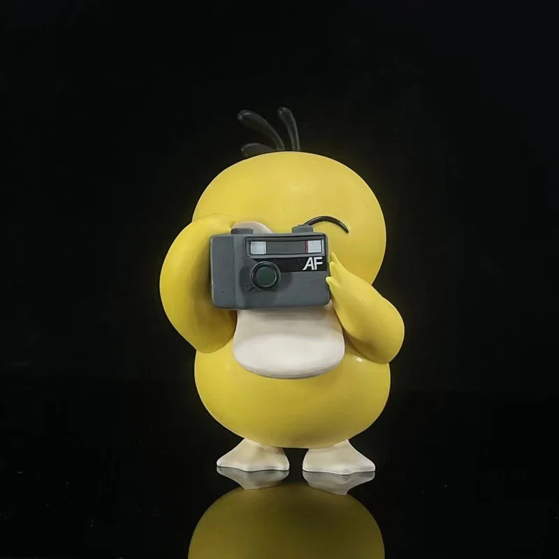 Anime Pokemon Psyduck tomar fotografías Linda muñeca figura de acción figura de vinilo colección modelo de juguete