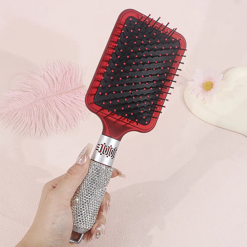 Luxurious air cushion comb with artificial diamonds for home use. Smooth hair curling air bag comb. Simple design to prevent kno