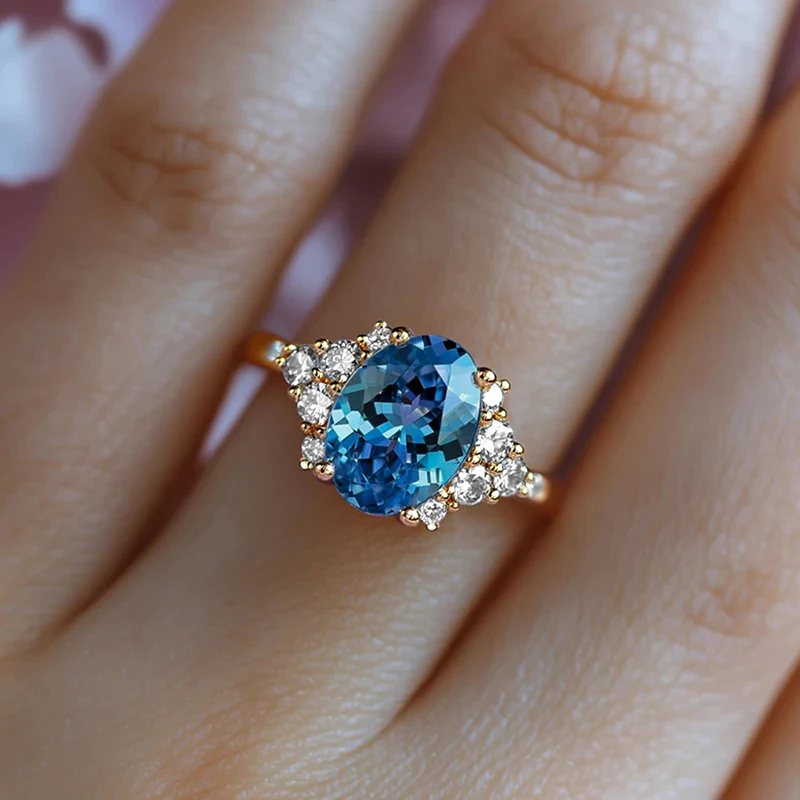 Huitan Eleganter Damenring für Hochzeit, Verlobung, luxuriös, mit hellblauem CZ-Stein, Party-Accessoires, zarter Damenschmuck, Geschenk – Detail 17