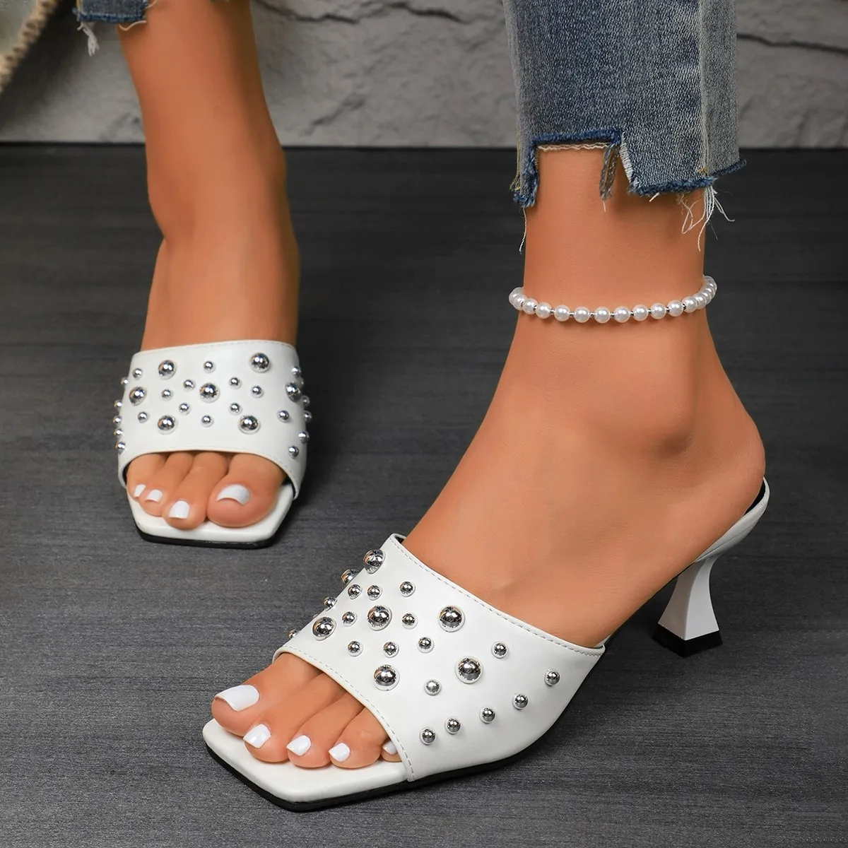 

New fashionable European and American style large-sized riveted open-toe stiletto high heels and one-heel high heels slippers