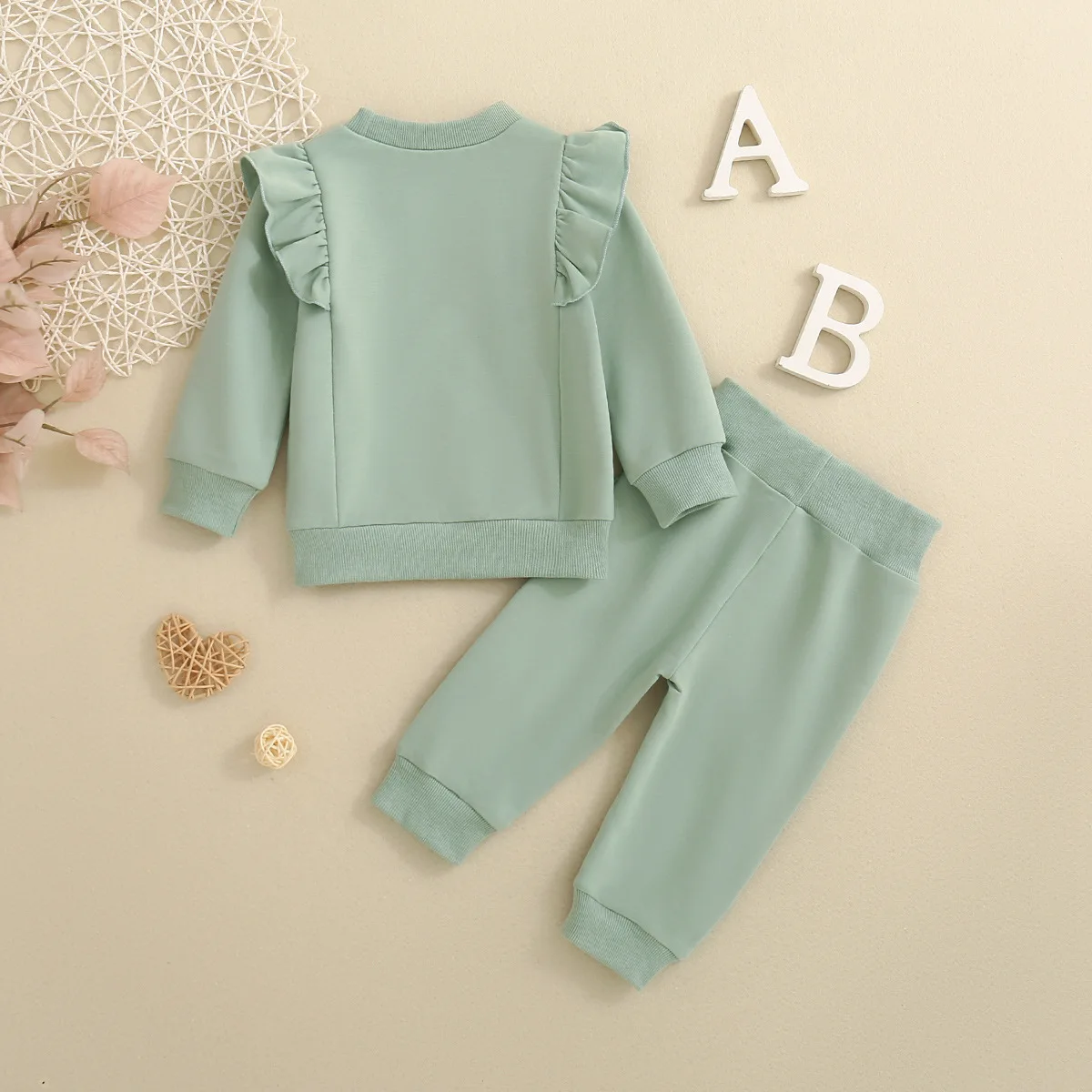 Autumn baby girl solid color pleated lace long-sleeved T-shirt top and trousers two-piece set
