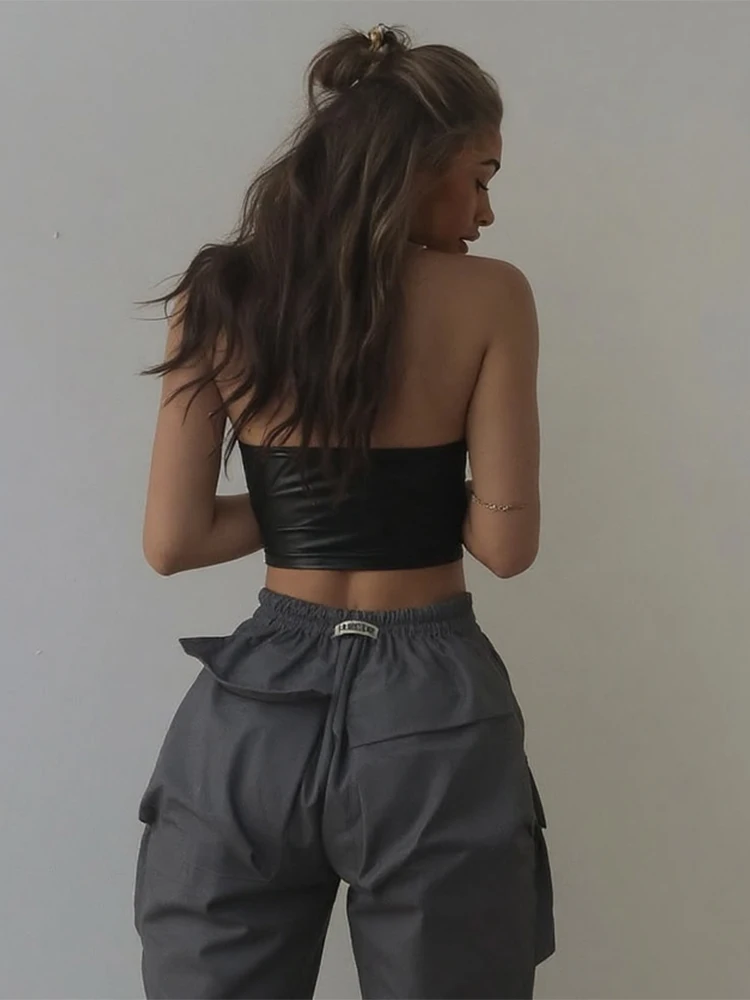 Sisterlinda-camisetas sin mangas de estilo salvaje para mujer, cárdigan con cremallera de piel sintética, diseño sin espalda, ombligo expuesto, ropa de calle clásica