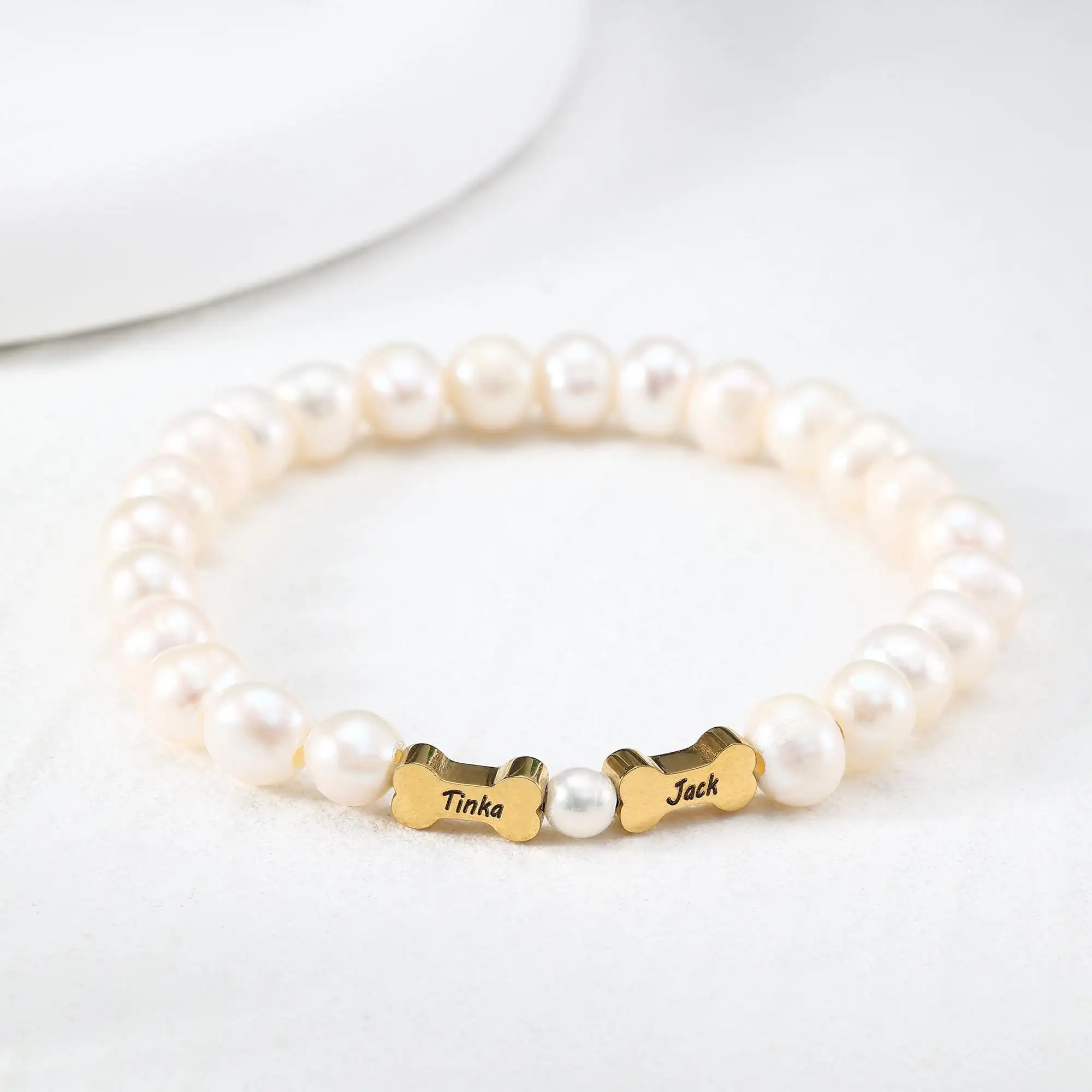 

Браслеты из пресноводного жемчуга с гравировкой имен питомцев, браслеты в форме собачьей косточки с именами, подарок для молодых собаководок.