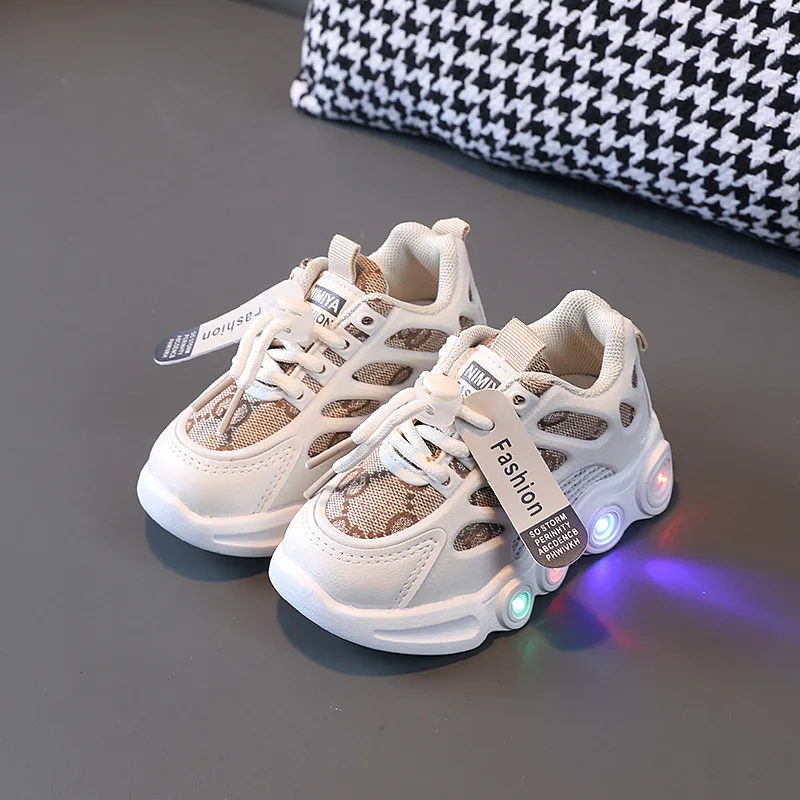 Primavera e autunno nuove scarpe luminose a LED scarpe per bambini con tessitura e superficie in tessuto traspirante per bambini taglia 24-34