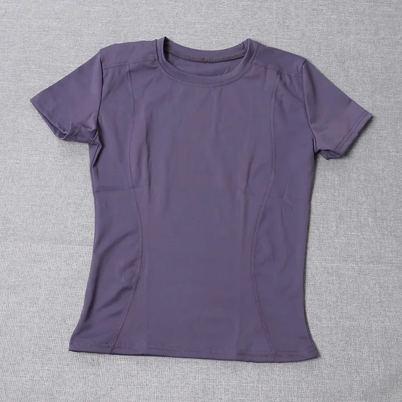 T-shirt da palestra a compressione ad asciugatura rapida da donna - Camicia da allenamento traspirante slim fit per corsa e allenamento Abbigliamento sportivo elastico in tinta unita