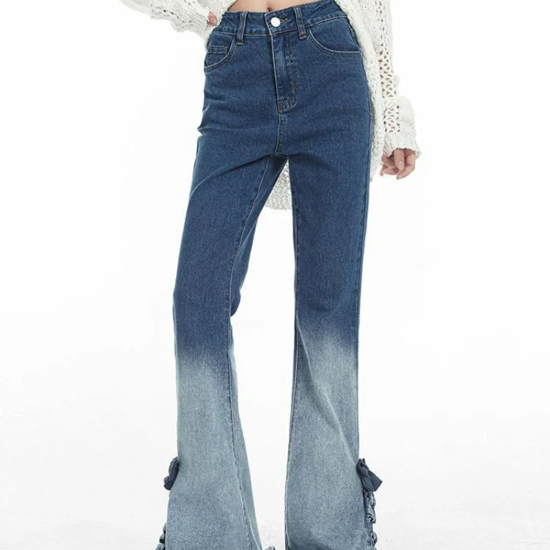 Jeans coreani con bordo orecchio sfumato diviso Jeans da donna primaverili a vita alta con pannelli Tasche con cerniera Bottone Pantaloni micro svasati dritti slim