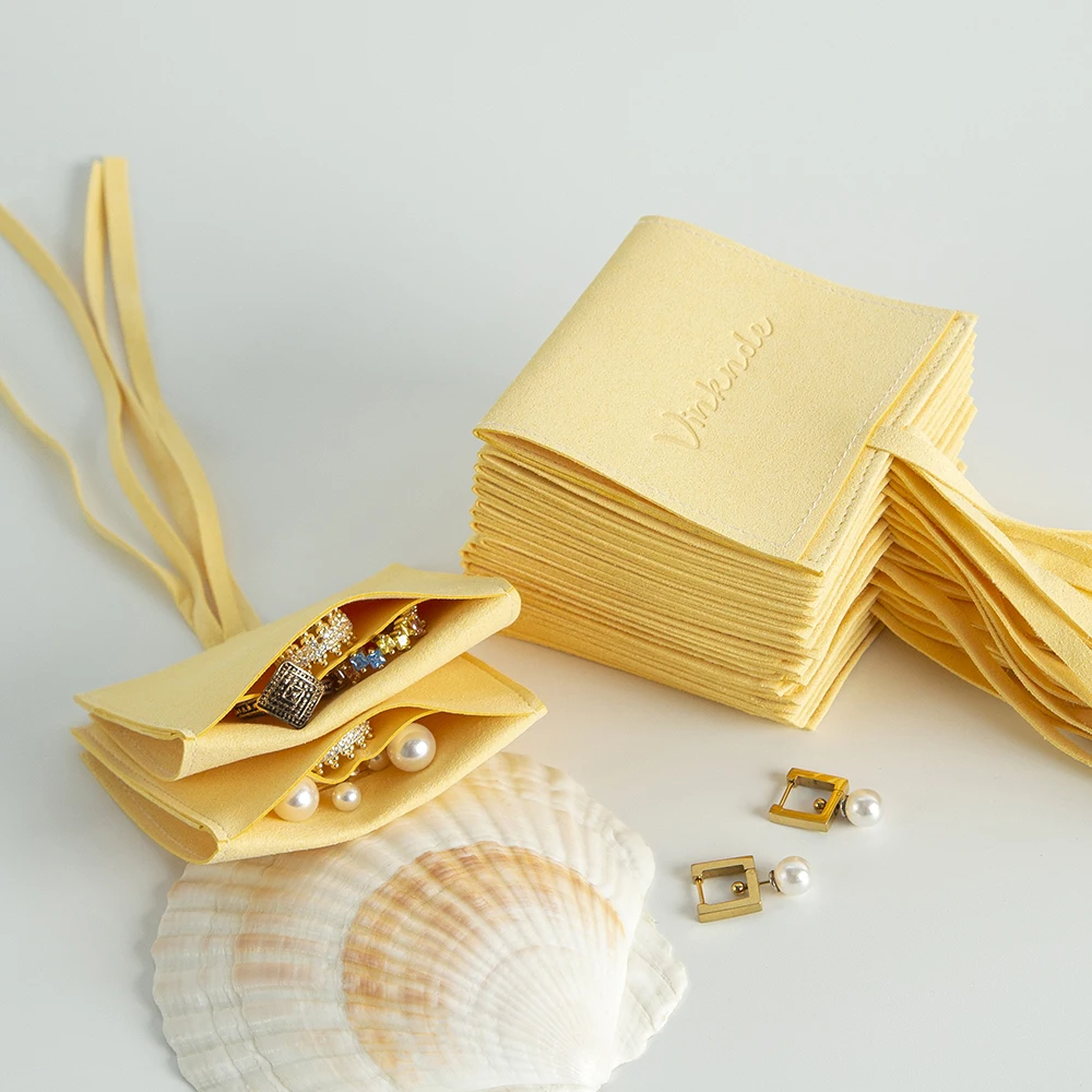 شخصية الأصفر ستوكات مجوهرات شنطة هدايا 100 قطع المخملية الجلد المدبوغ أقراط خواتم عيد الميلاد حزب الحقيبة بشكل منفصل حماية أكياس