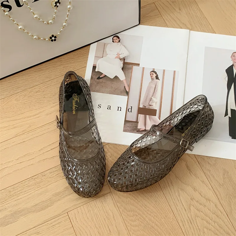 Transparent crystal women's shoes 2026 summer new jelly hollow soft sole fashionable versatile outer wear cool slippers women