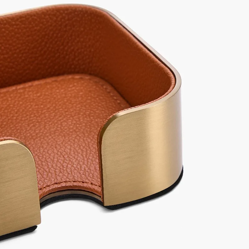 Leather cup holder with gold trim. Perfect for use in homes, hotels and contemporary design venues.