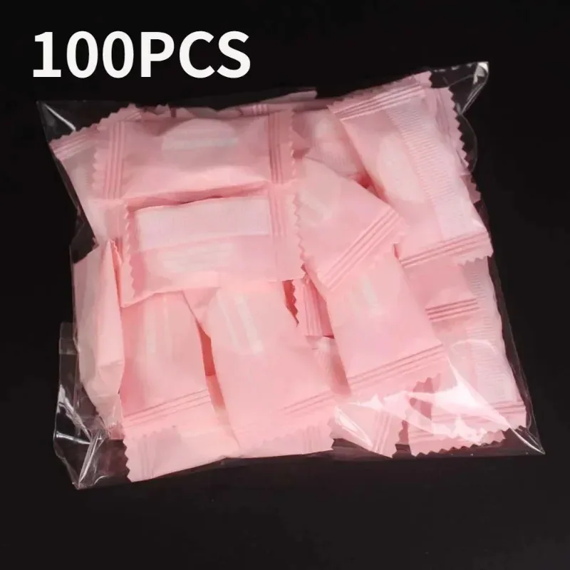 100 Uds Mini toalla comprimida cápsulas desechables toalla mágica cuidado de la cara tableta viajes al aire libre toallitas de tela máscara de tejido de papel