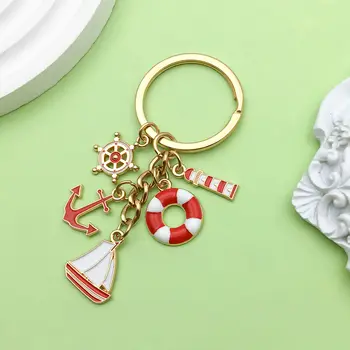 1個琺瑯航海主題鑰匙圈,合金材質,包含帆船、燈塔、錨、救生圈等設計元素,適用於車鑰匙、背包、錢包等。 8 最佳銷售 錨形鑰匙扣 - №5