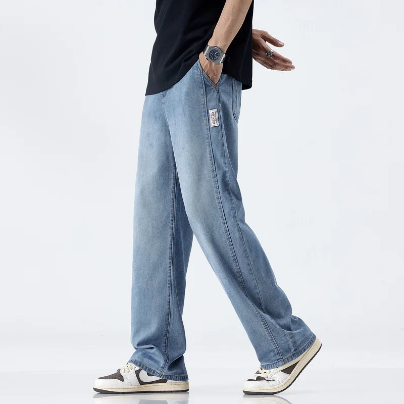 

Лето 2022, новые корейские ультратонкие джинсы, мужские свободные прямые трубки, универсальные модные однотонные широкие брюки длиной до пола