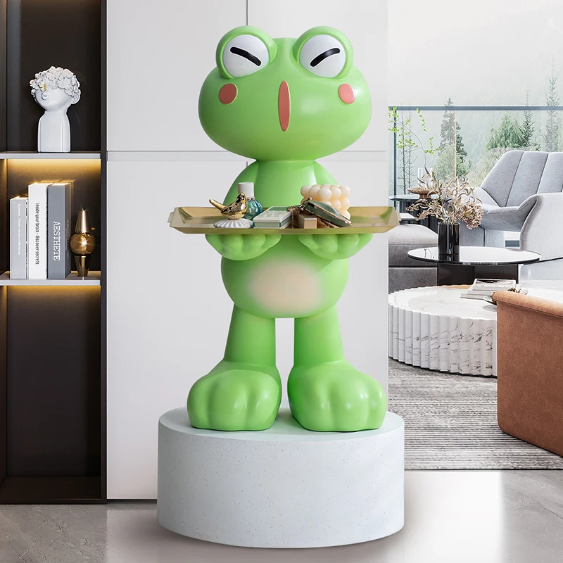 Creative Frog That Only Goes Into The Piggy Bank But Never Leaves It, A Floor Tray Ornament Next To The Simple TV Cabinet