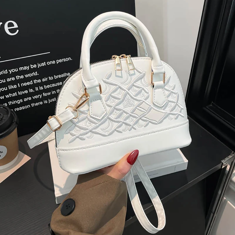 nova-bolsa-de-ombro-transversal-pequena-de-couro-pu-estilo-niche-de-alta-qualidade-2026-bolsa-feminina-versatil-para-o-dia-a-dia