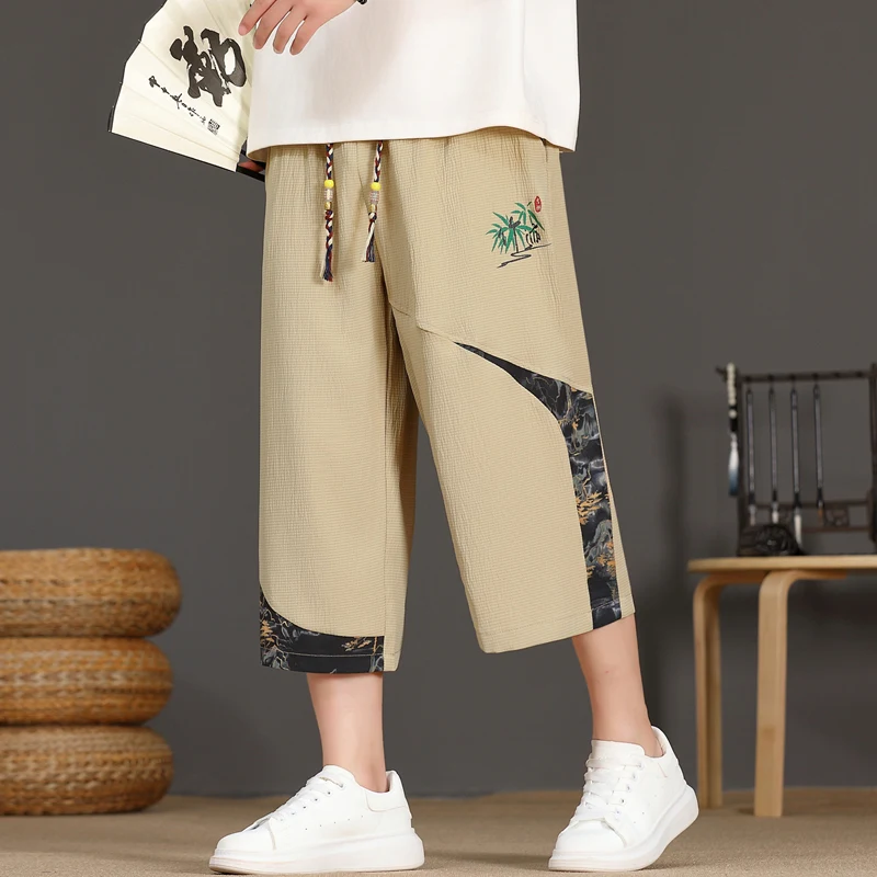 

Summer 2025 Men's Casual Ice Silk Thin Spor orts Seven-Foot Pants Qui-Drng Loose Fit Faion Urban Sle Youth orts