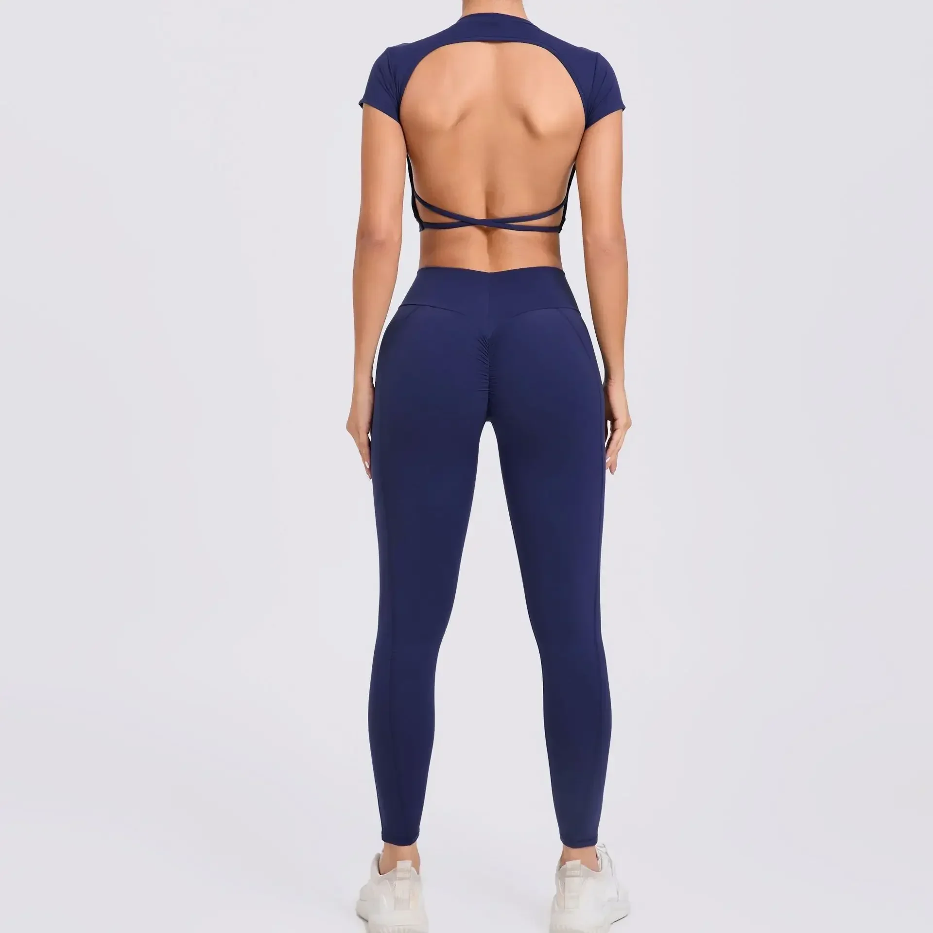 

Seamless Yoga Sports Backless Cross Back Yoga Jumpsuit shorts Dance Running Fitness Integrated Hip Lifting Gym Set for Women