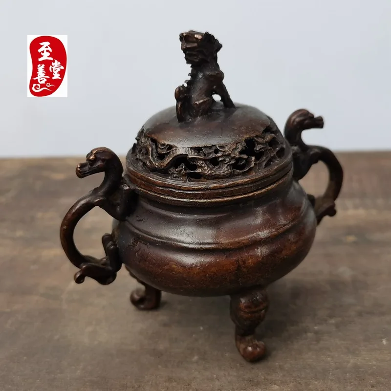 Antique-style alloy copper incense burner with a patina finish, featuring a double dragon design and double handles, suitable fo