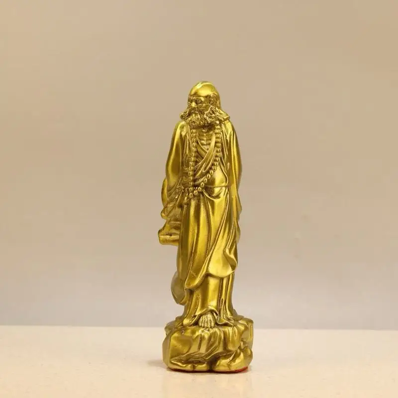 Brass - Master Daruma Standing On A Reed Crossing The River Feng Shui Ornament
