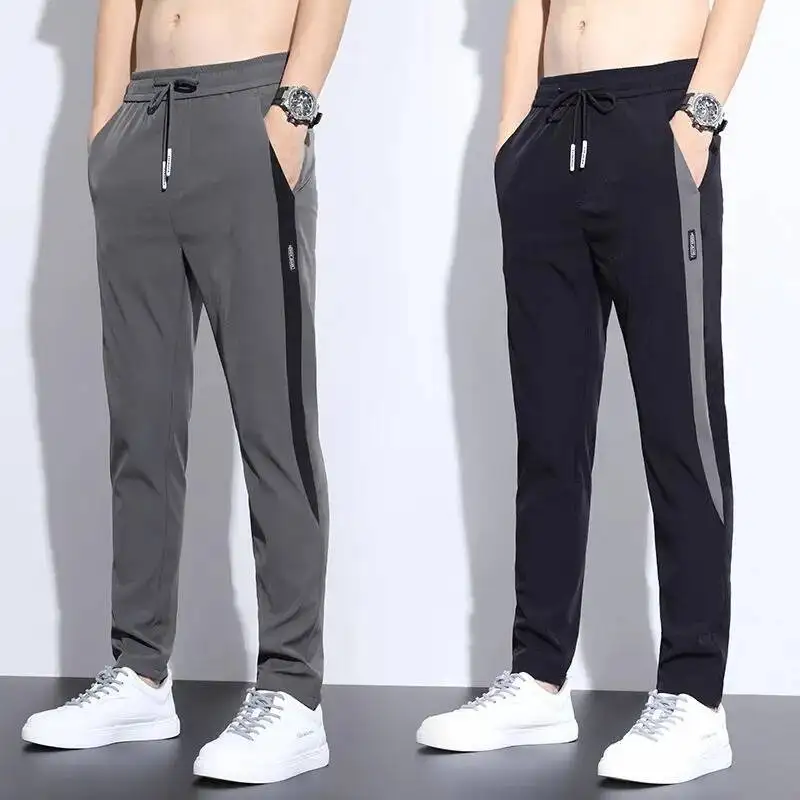

Summer Thin Men Quick Dry Sweatpants Streetwear Fashion Elastic Waist Big Size New Tracksuit Male Joggers Sports Casual Trousers